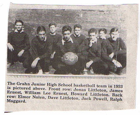 Eight Grahn Junior High basketball players above a printed caption naming the 1933 team.